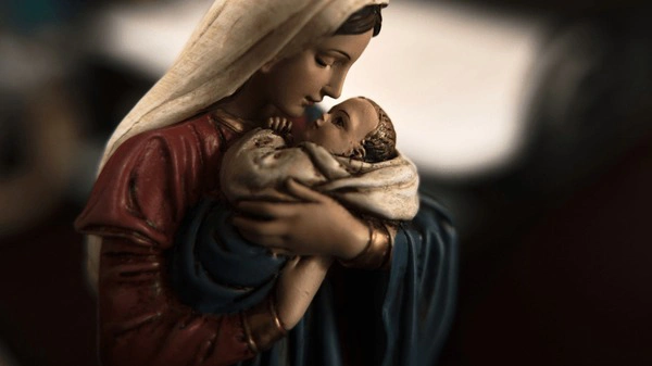 An image of Mary with baby Jesus, symbolizing her role as a mother and her faith.